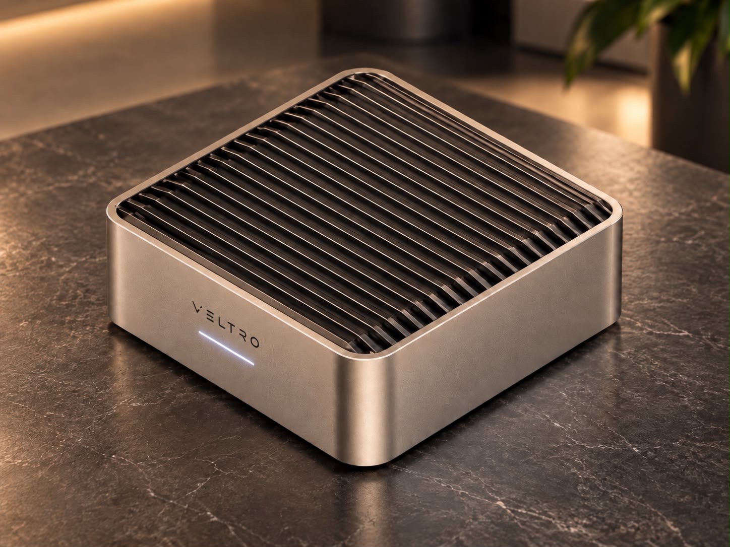VELTRO, the my iNDUSTRIES AI Server, in champagne finish, with its sculpted cooling grille and status light.